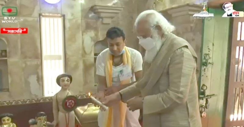 Indian PM Narendra Modi interacts with Matua community in Orakandhi, prays at Hari Mandir